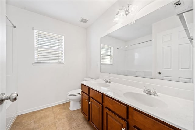 full bath with a shower, visible vents, a sink, and toilet