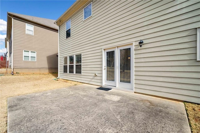 rear view of property with a patio area