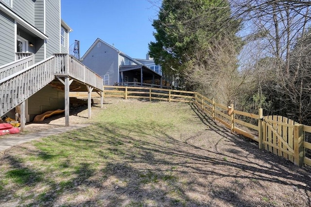 537 Autumn Ridge Dr, Canton, GA 30115 - fenced backyard with a wooden deck and stairs