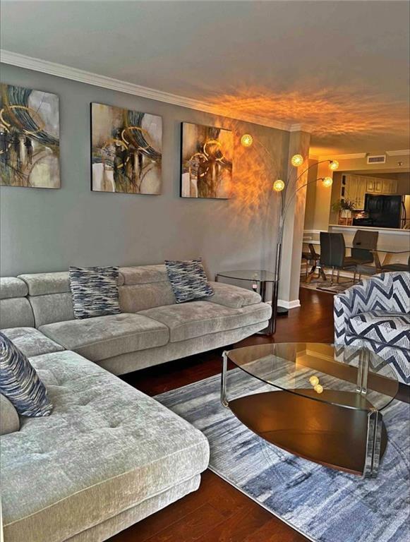 795 Hammond Dr Unit 813, Sandy Springs, GA 30328 - living area with ornamental molding and wood finished floors