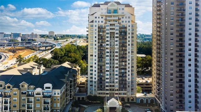 795 Hammond Dr Unit 813, Sandy Springs, GA 30328 - view of building exterior with a city view