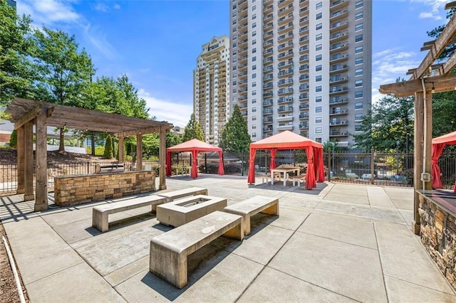 795 Hammond Dr Unit 813, Sandy Springs, GA 30328 - view of patio / terrace featuring a gazebo, a pergola, and an outdoor fire pit