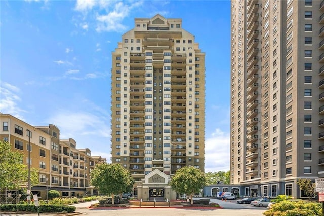 795 Hammond Dr Unit 813, Sandy Springs, GA 30328 - view of property featuring uncovered parking