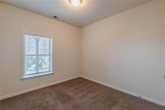 empty room featuring carpet