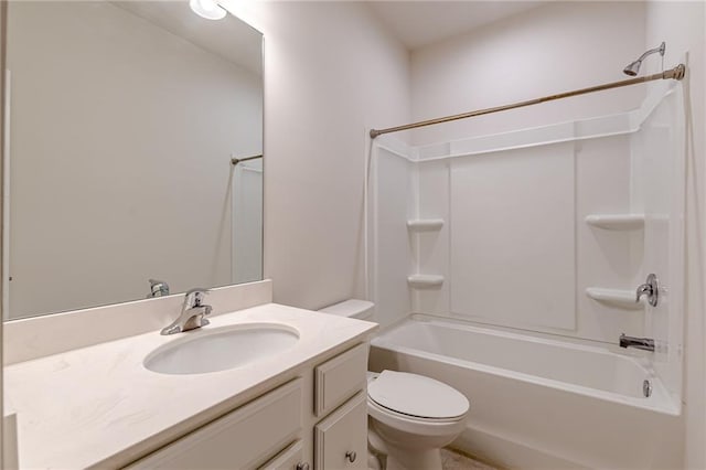 full bathroom featuring shower / bathing tub combination, vanity, and toilet