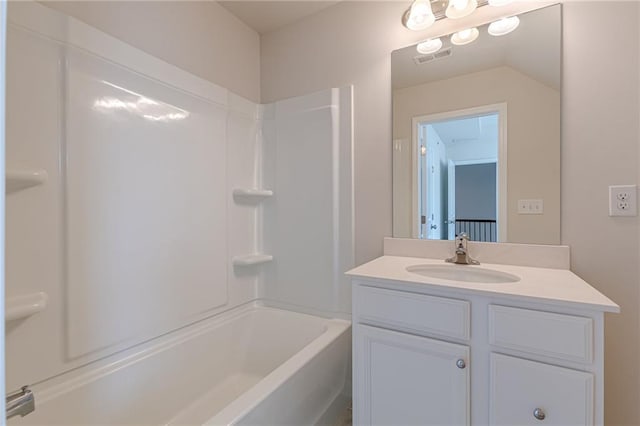 bathroom featuring shower / bathing tub combination and vanity