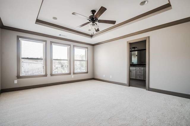 1435 Druid Mnr, Atlanta, GA 30329 - unfurnished room with a raised ceiling, healthy amount of natural light, carpet flooring, crown molding, and baseboards