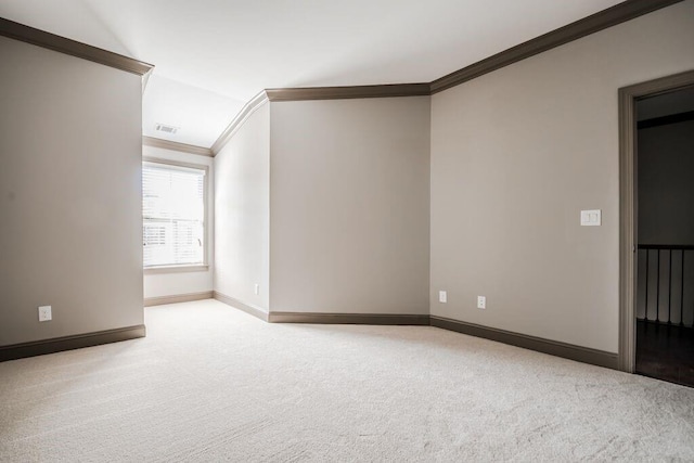 1435 Druid Mnr, Atlanta, GA 30329 - carpeted empty room with crown molding and baseboards
