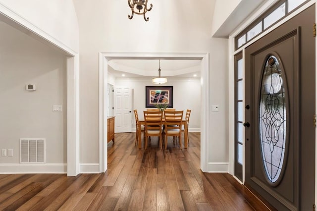 foyer featuring dark hardwood / wood-style floors