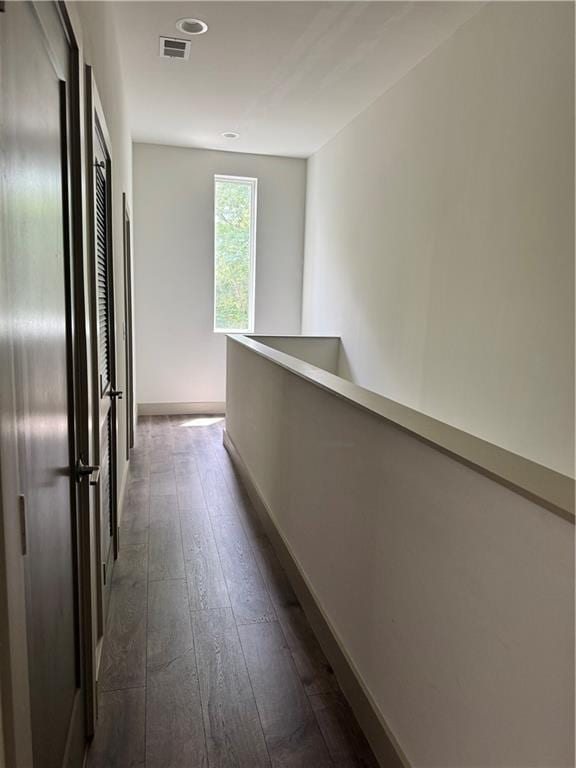 1153 Reynolds Square Ln # 16, Atlanta, GA 30307 - corridor featuring dark wood finished floors, baseboards, and recessed lighting