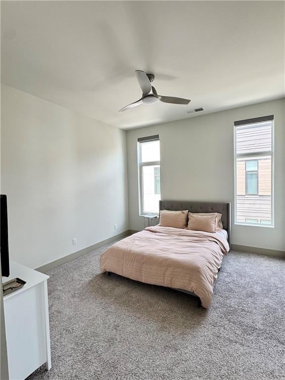 1153 Reynolds Square Ln # 16, Atlanta, GA 30307 - carpeted bedroom featuring baseboards and ceiling fan