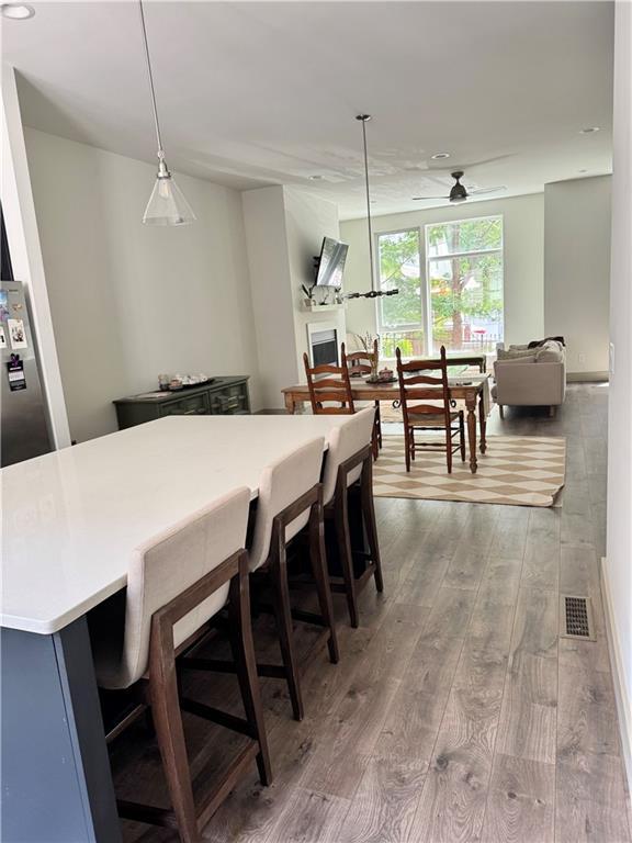 1153 Reynolds Square Ln # 16, Atlanta, GA 30307 - dining area featuring wood finished floors and ceiling fan