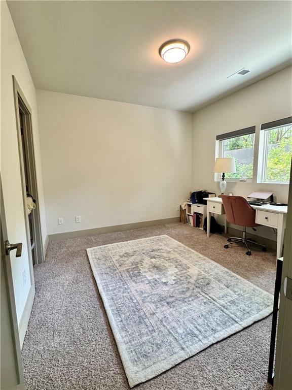 1153 Reynolds Square Ln # 16, Atlanta, GA 30307 - office area featuring carpet floors and baseboards
