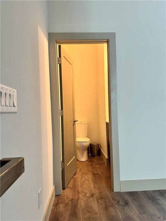 1153 Reynolds Square Ln # 16, Atlanta, GA 30307 - bathroom with toilet, wood finished floors, and baseboards