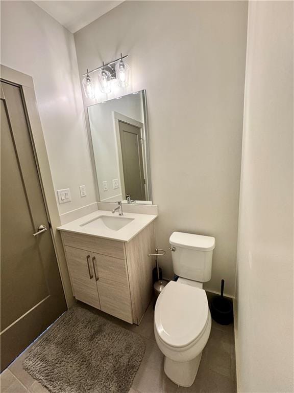 1153 Reynolds Square Ln # 16, Atlanta, GA 30307 - half bathroom featuring tile patterned flooring, vanity, and toilet