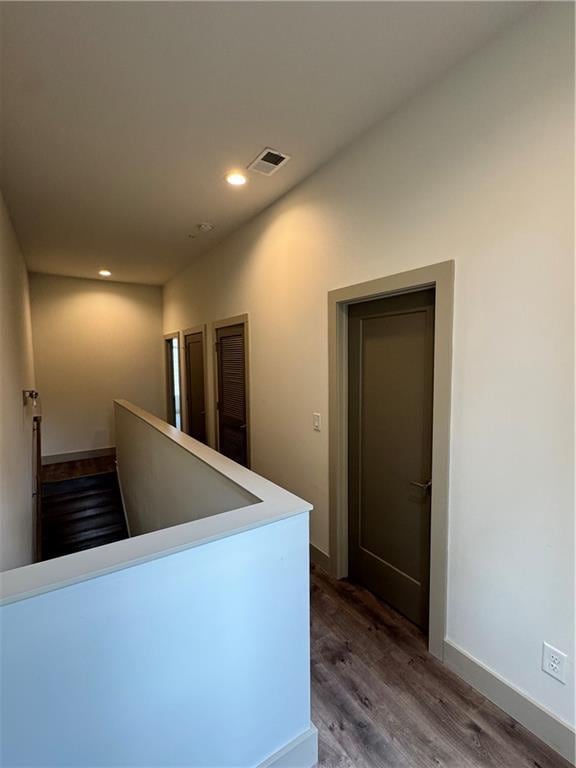 1153 Reynolds Square Ln # 16, Atlanta, GA 30307 - hall featuring wood finished floors, recessed lighting, and baseboards