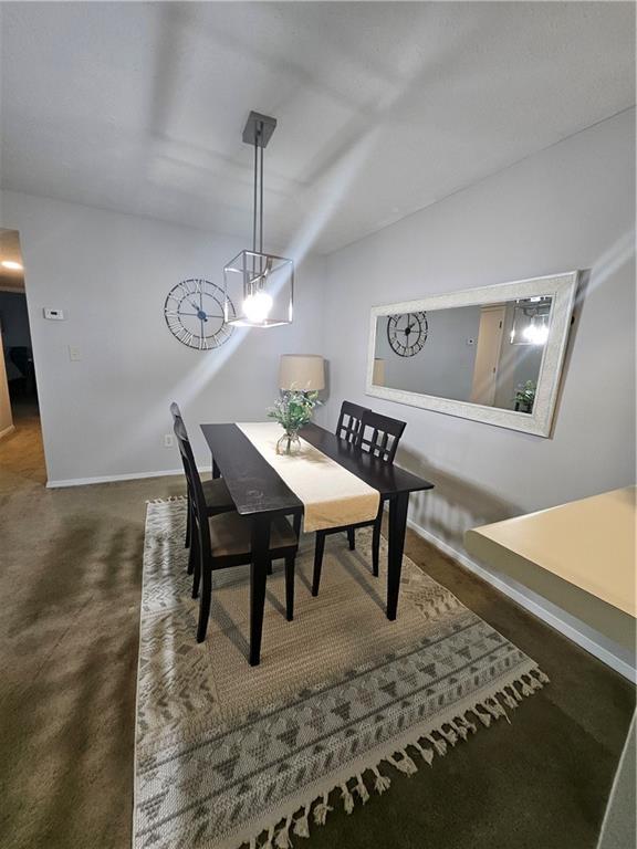 dining room with baseboards