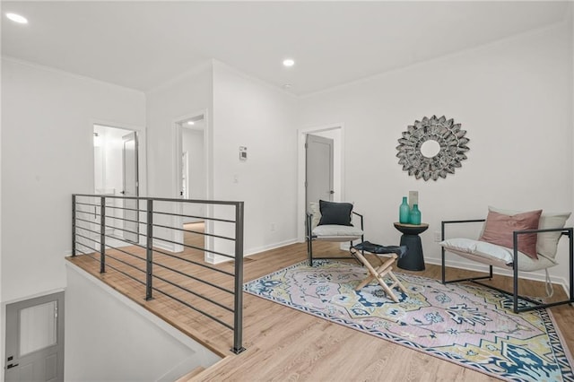 2926 5th St SW, Atlanta, GA 30315 - living area with an upstairs landing, wood finished floors, crown molding, recessed lighting, and baseboards