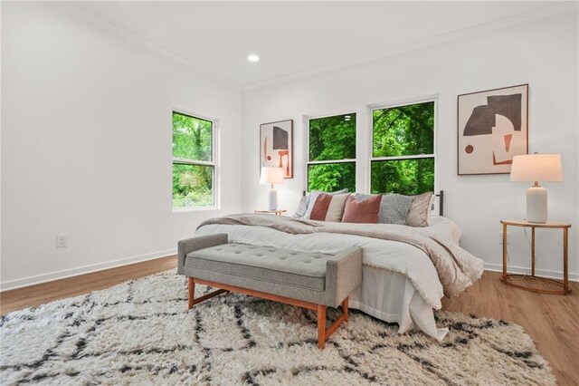 2926 5th St SW, Atlanta, GA 30315 - bedroom with crown molding, wood finished floors, baseboards, and recessed lighting