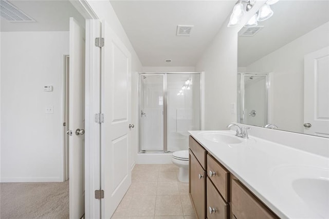 full bathroom featuring a stall shower, tile patterned flooring, visible vents, and a sink