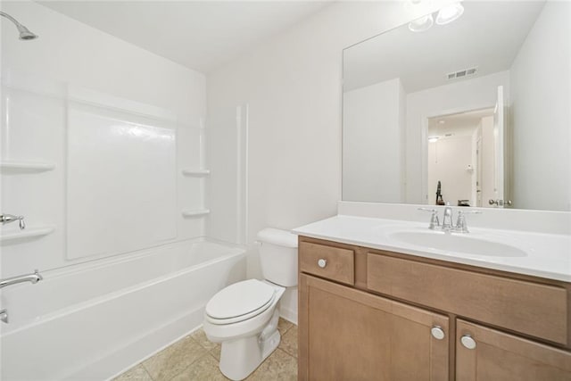 full bath with visible vents, toilet, tile patterned floors, vanity, and washtub / shower combination