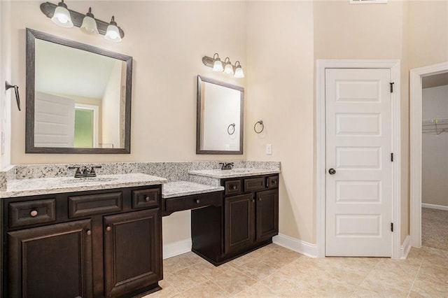 381 Homestead Cir, Forsyth, GA 31029 - full bath with double vanity and a walk in closet