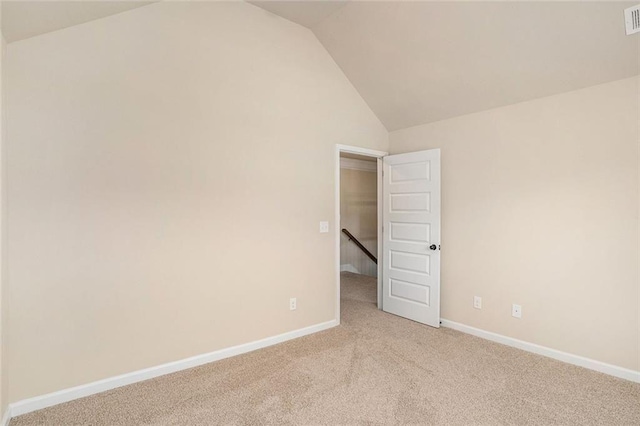 381 Homestead Cir, Forsyth, GA 31029 - carpeted empty room featuring lofted ceiling and baseboards