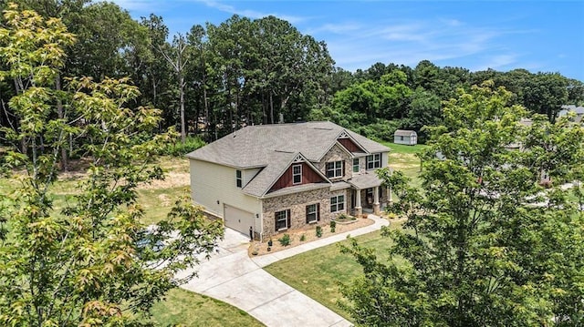 381 Homestead Cir, Forsyth, GA 31029 - view of front of house featuring driveway, an attached garage, and a front yard