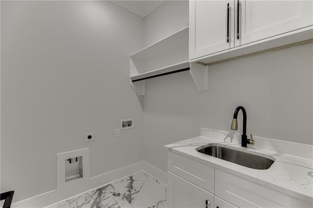 clothes washing area featuring washer hookup, sink, cabinets, and hookup for an electric dryer