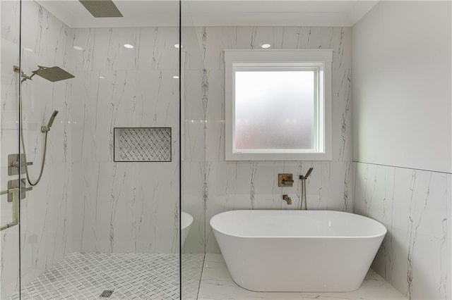 bathroom with separate shower and tub