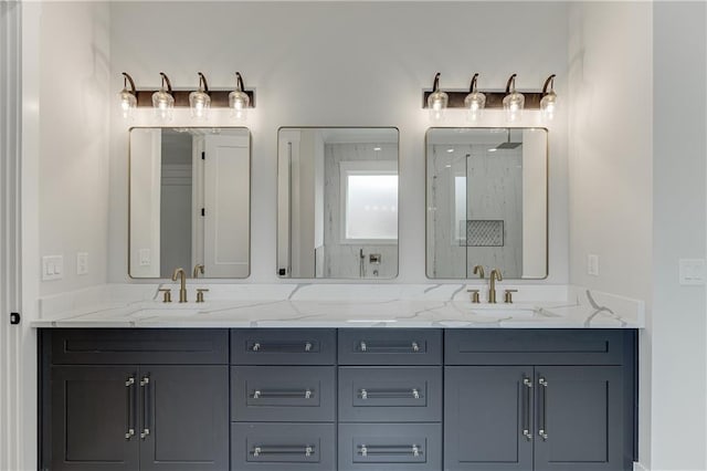 bathroom featuring vanity and a shower