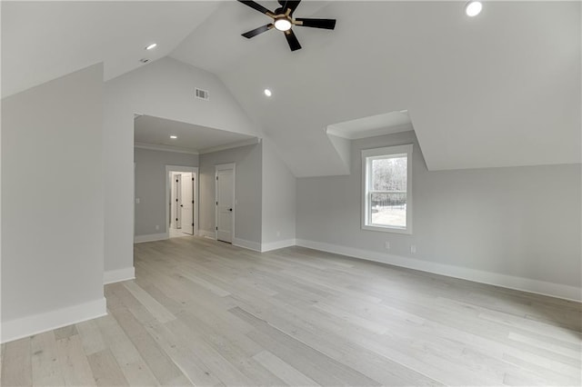 bonus room featuring ceiling fan, vaulted ceiling, and light wood-type flooring