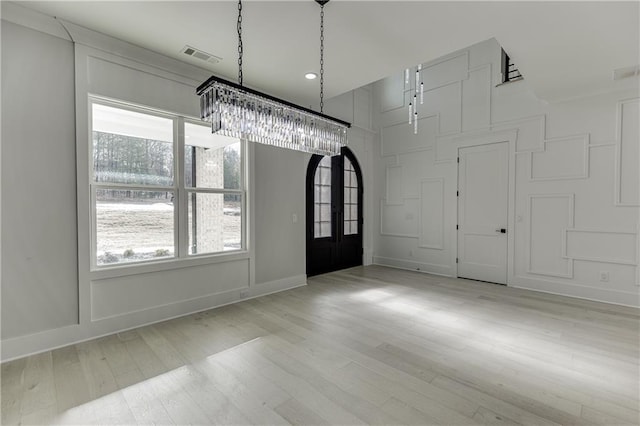 interior space with hardwood / wood-style flooring