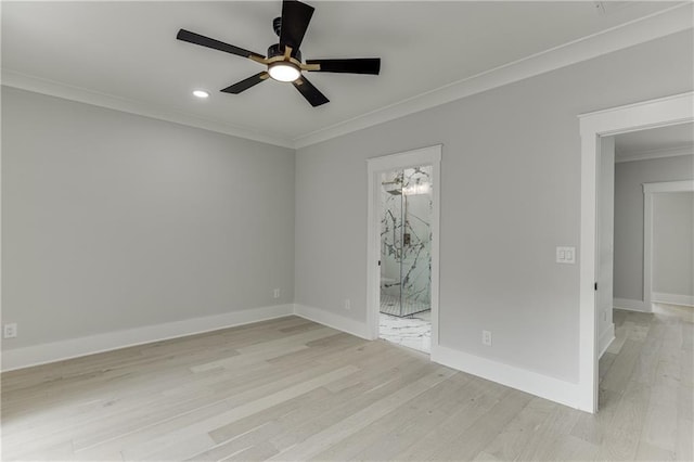 unfurnished room with crown molding, ceiling fan, and light wood-type flooring