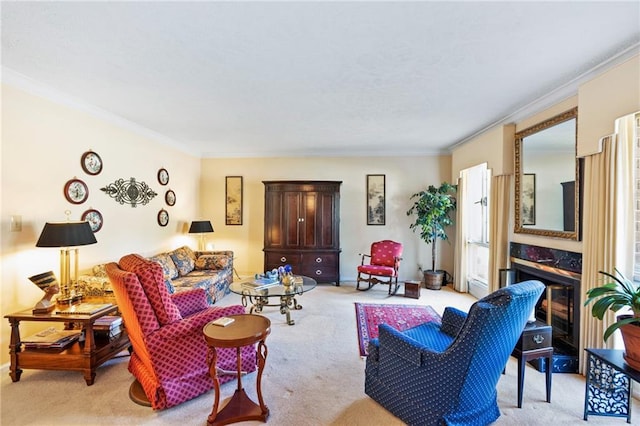 living room with ornamental molding and light carpet