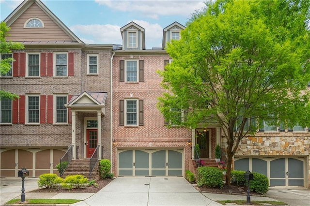 2025 Eagle Rdg, Roswell, GA 30076 - view of front of house with an attached garage, concrete driveway, and brick siding