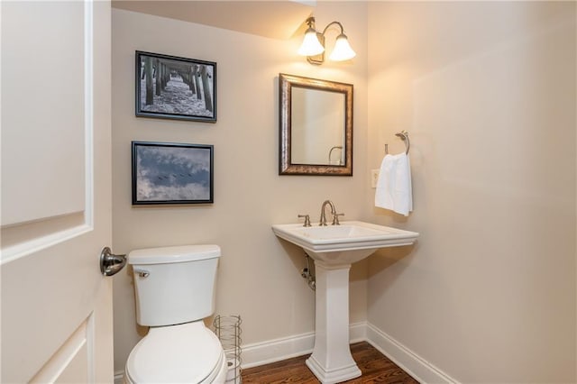 2025 Eagle Rdg, Roswell, GA 30076 - bathroom with toilet, wood finished floors, and baseboards