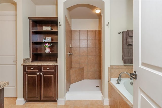2025 Eagle Rdg, Roswell, GA 30076 - full bath featuring a garden tub, tiled shower, and tile patterned floors