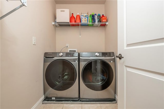 2025 Eagle Rdg, Roswell, GA 30076 - washroom featuring washer and clothes dryer, tile patterned floors, and baseboards
