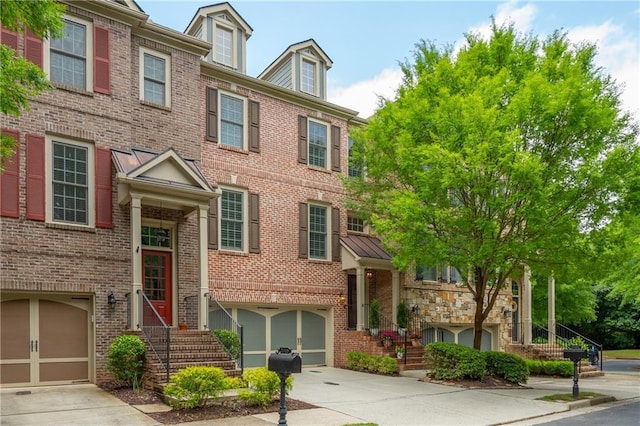 2025 Eagle Rdg, Roswell, GA 30076 - multi unit property featuring driveway, an attached garage, and brick siding