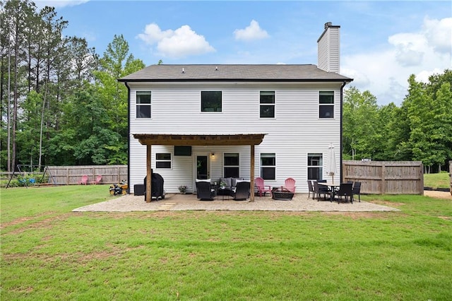 1417 Woodrow Kay Rd, Rockmart, GA 30153 - back of house with a patio area, a chimney, and outdoor lounge area