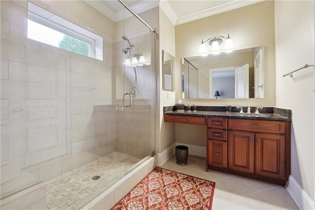 bathroom featuring tile patterned flooring, vanity, an enclosed shower, and ornamental molding