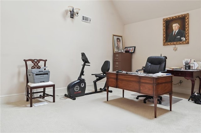 office with light carpet and lofted ceiling