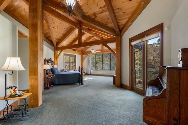 carpeted bedroom with multiple windows, beam ceiling, and wooden ceiling