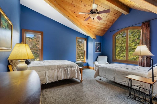 bedroom featuring vaulted ceiling with beams, carpet floors, and ceiling fan