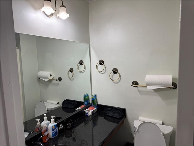 half bathroom with toilet, an inviting chandelier, and vanity