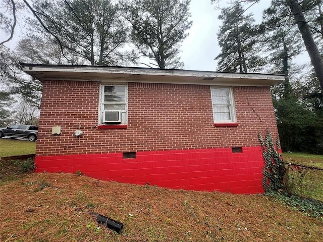 view of side of home with cooling unit