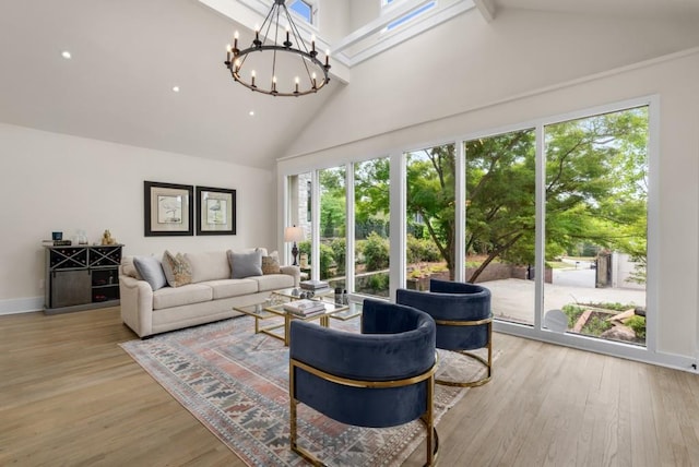 490 Rock Springs Rd NE, Atlanta, GA 30324 - dining space with crown molding, a notable chandelier, and light wood-style floors