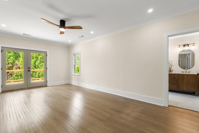 490 Rock Springs Rd NE, Atlanta, GA 30324 - spare room featuring crown molding, a ceiling fan, visible vents, and a wealth of natural light