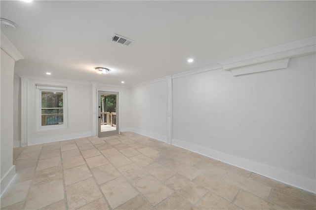 empty room with ornamental molding, recessed lighting, visible vents, and baseboards